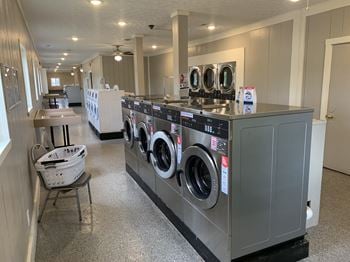 Modern laundry room at pickwick farms apartments, indianapolis, indiana